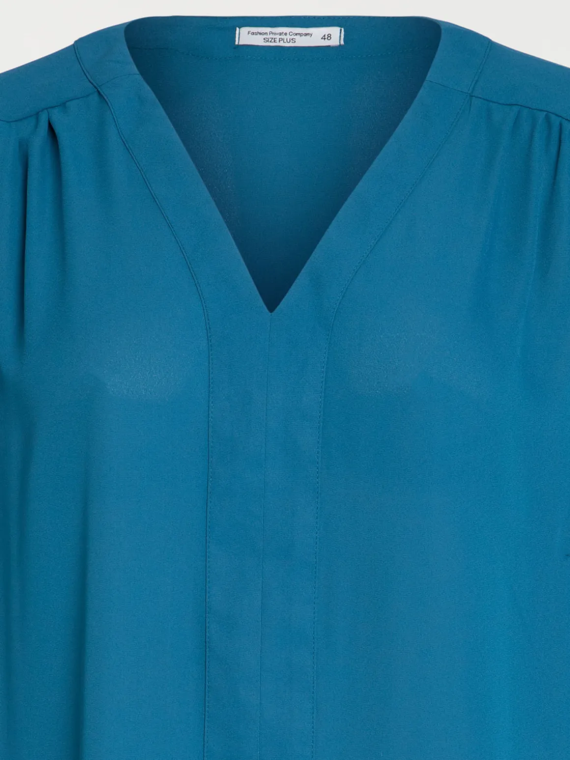 Blouse bleu paon grande taille femme