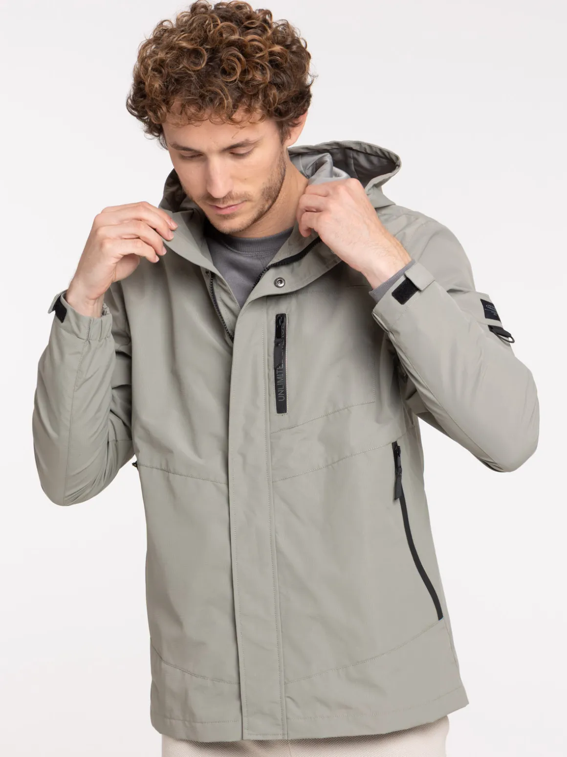 Blouson capuche multipoches homme