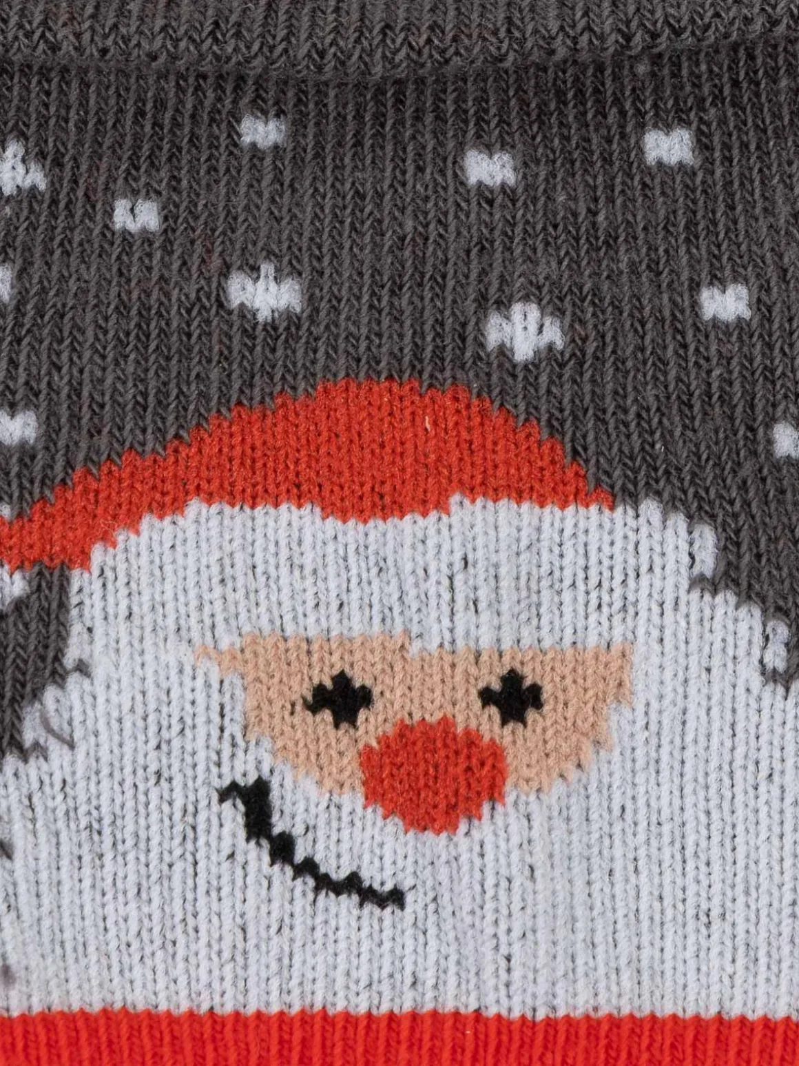 Chaussettes à pois et Père-Noël bébé