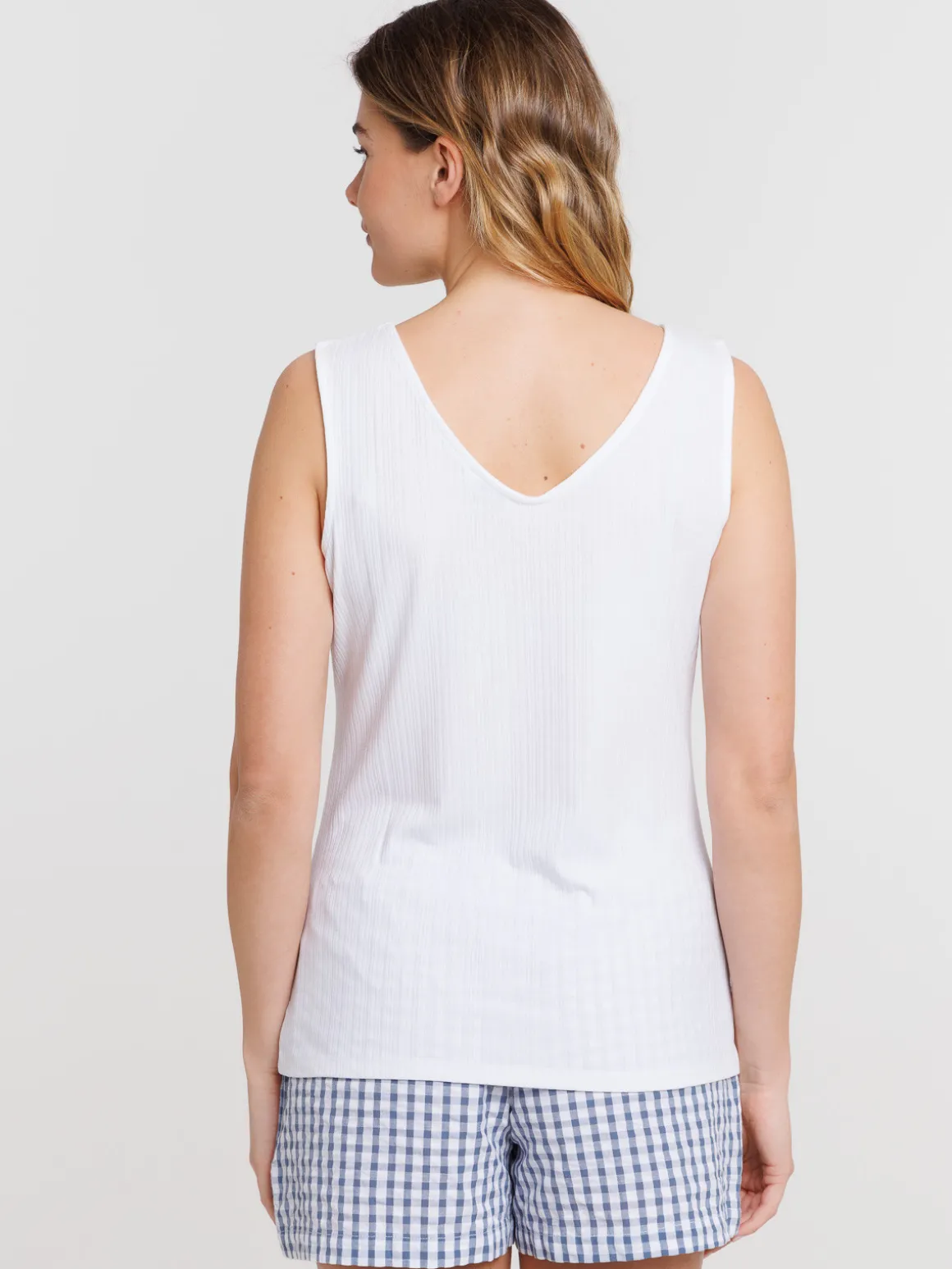 Débardeur blanc col V boutons femme