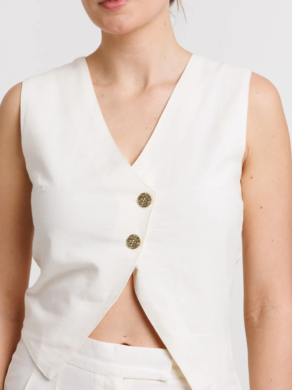 Gilet boutonné sans manches femme