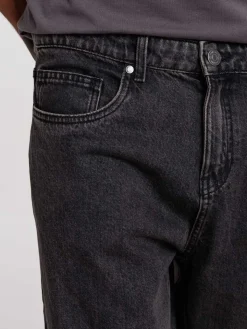 Jean loose noir lavé homme