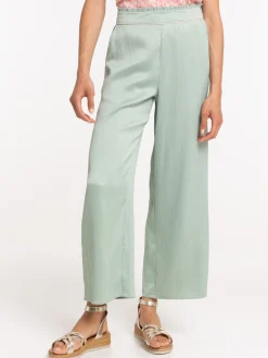 Pantalon effet plissé et satiné femme