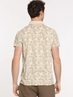 Polo motif feuille tropicale homme