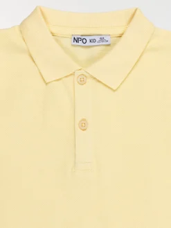 Polo uni jaune doux garçon (3-12A)