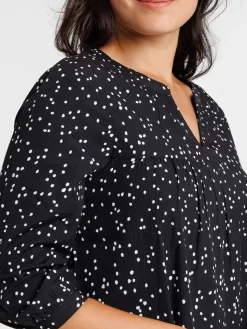 Robe à pois noire femme