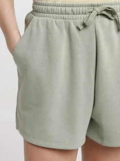 Short basique ample mousse clair femme