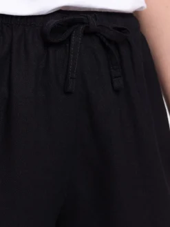 Short coloris noir femme
