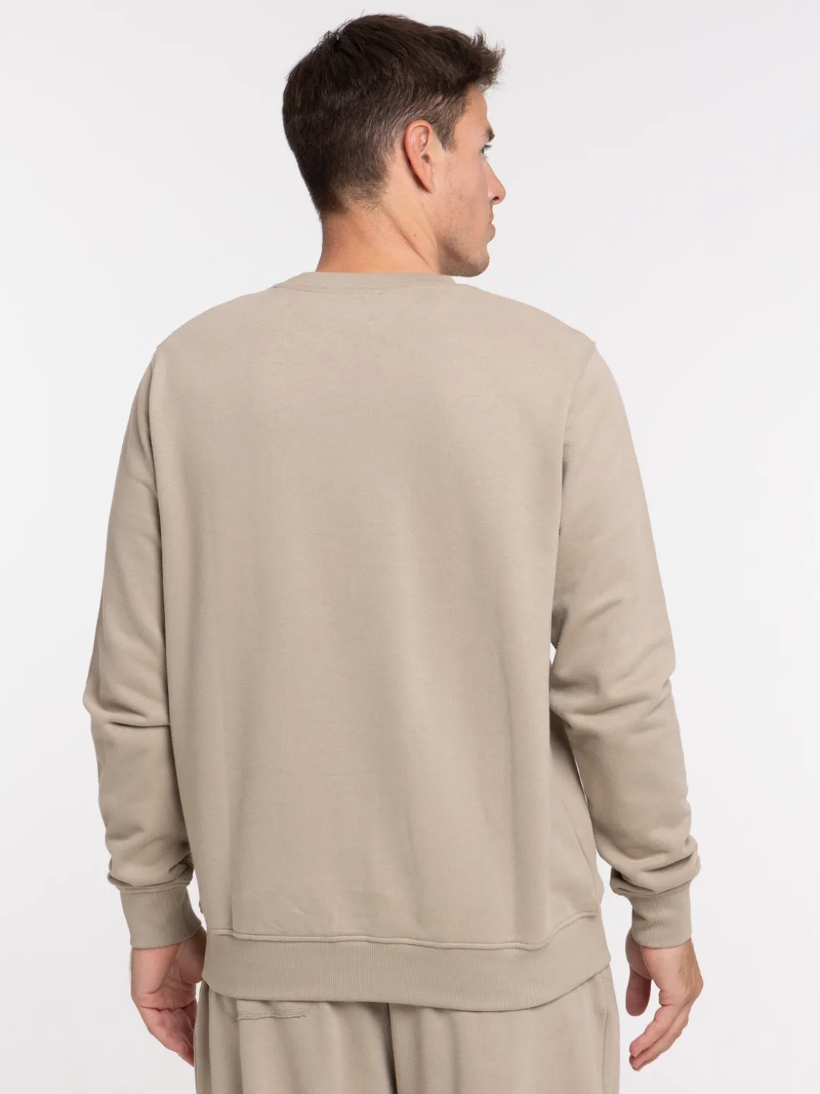 Sweat uni motif poitrine homme