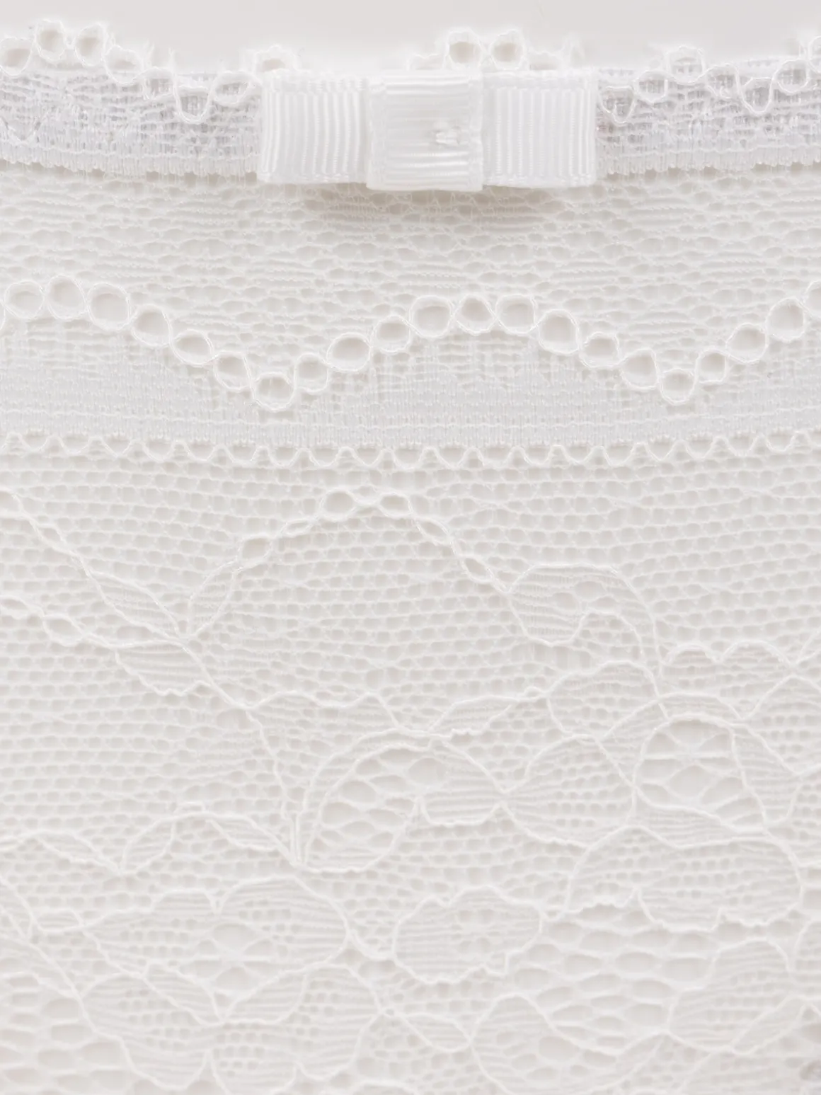 Tanga dentelle ivoire femme (34-46)