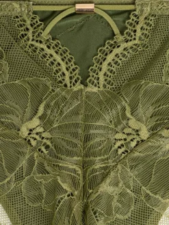 Tanga en dentelle fleurie femme (46-56)